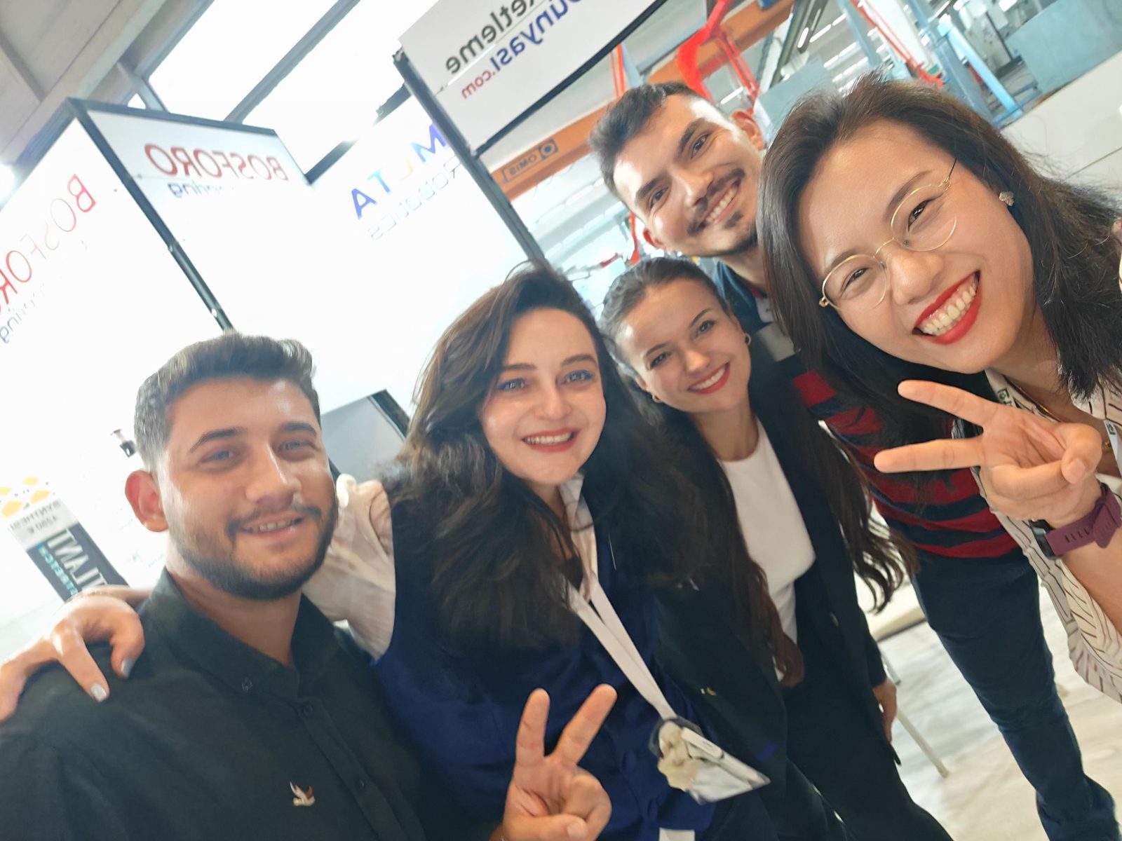 Visitors at the WIN-WIN PACK booth during an international packaging machinery exhibition