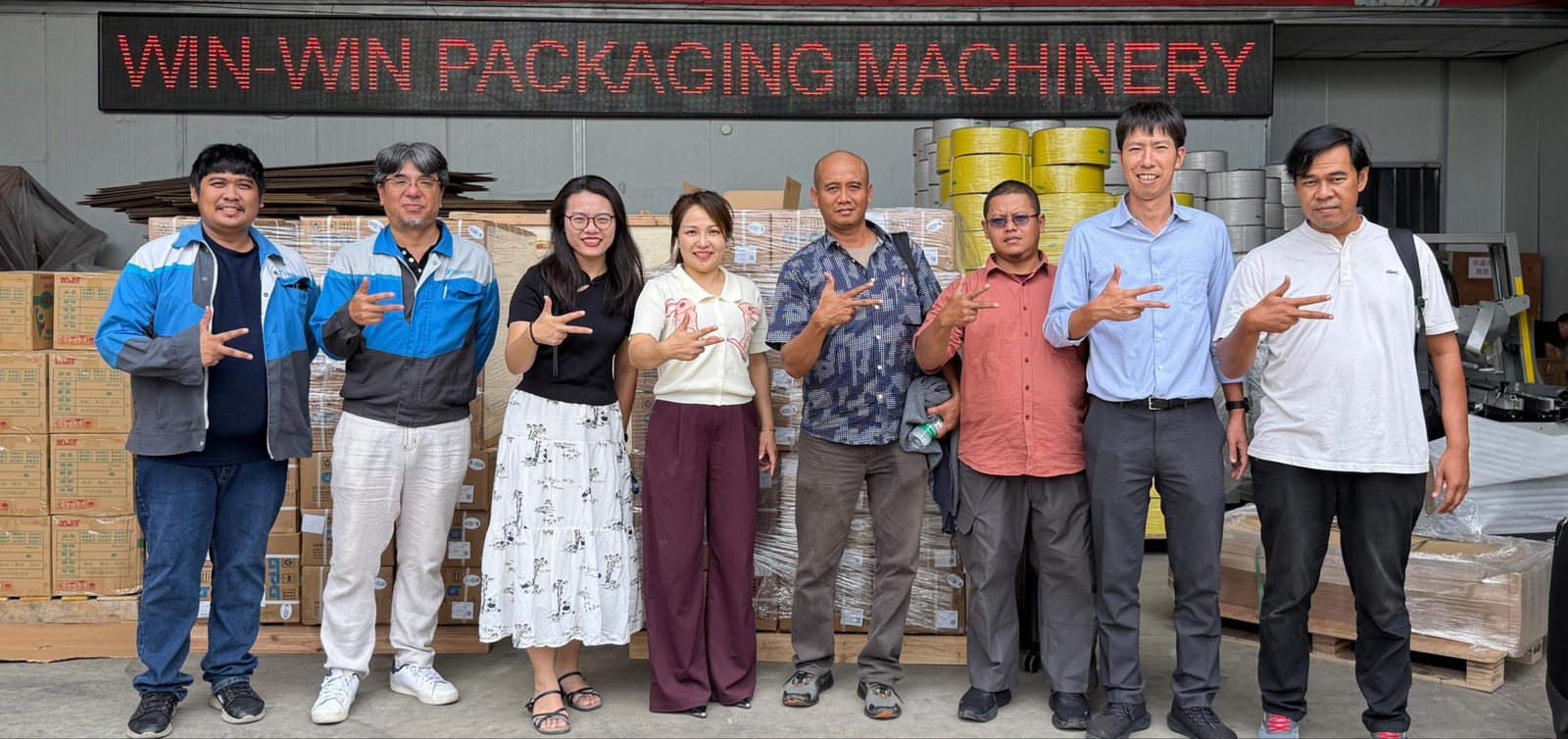 Export warehouse of the WIN-WIN PACK packaging machinery factory in China, with cartons and strapping film staged for shipment