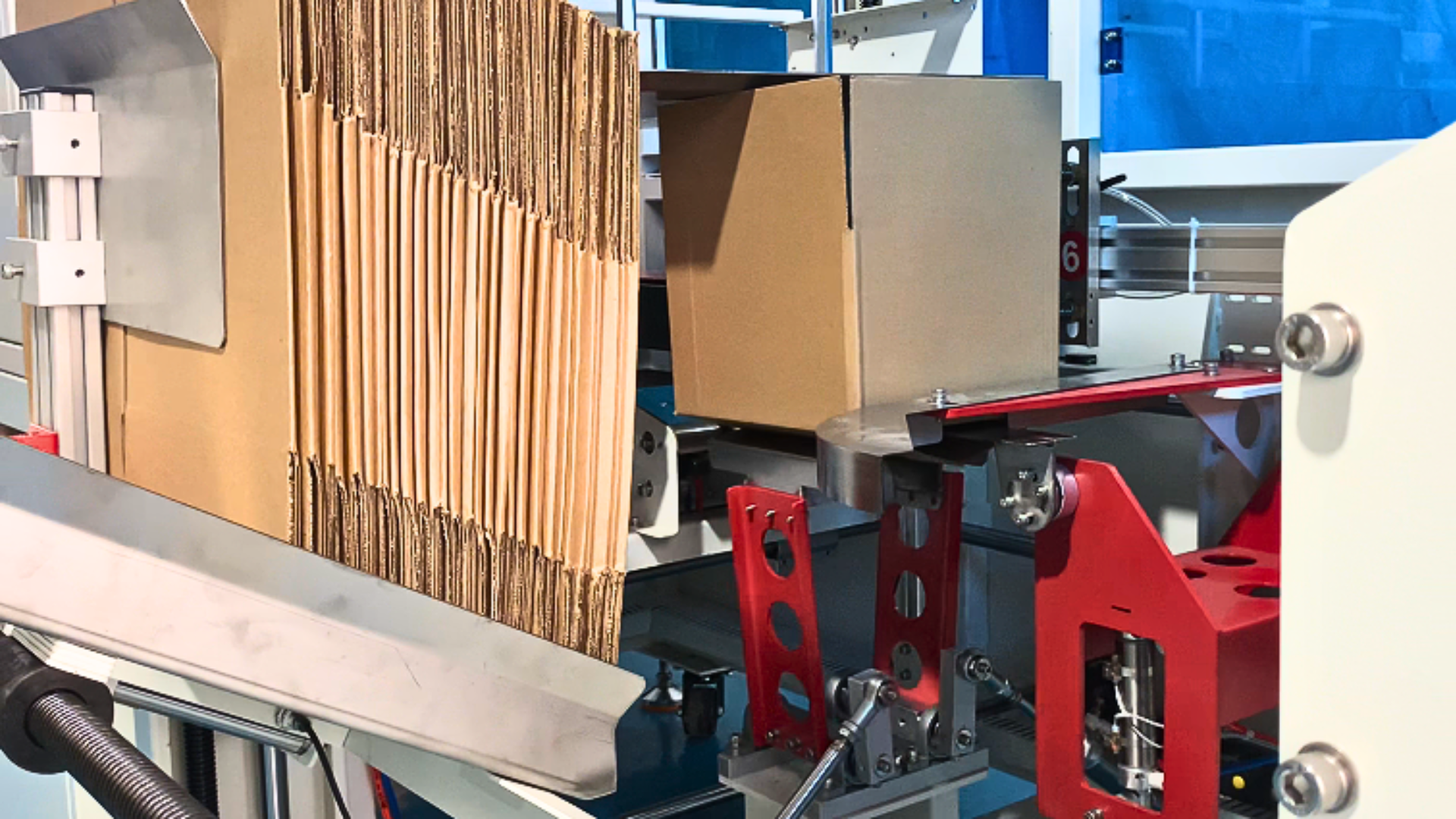 Carton Erector -- What is the mechanical principle of the carton erector?